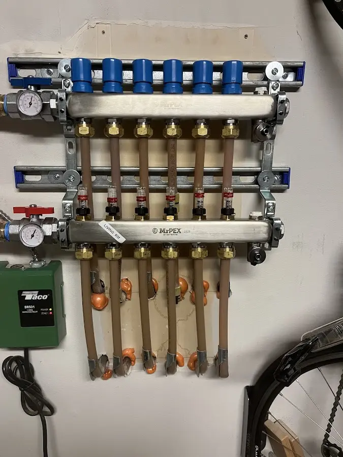 Plumber performing Gas Line Installation at a residential property in Cambridge