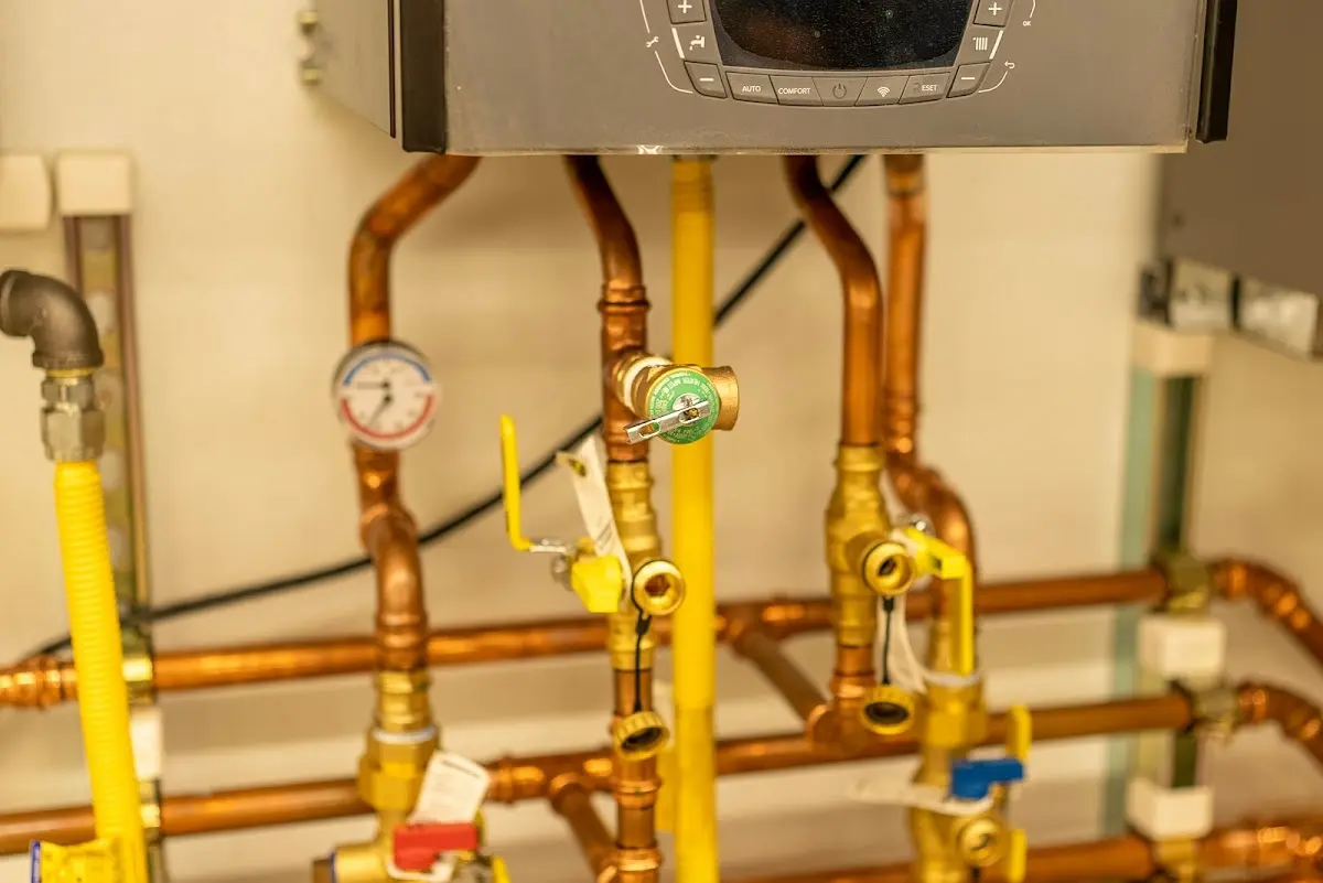 Licensed technician providing Water Heater Installation for a homeowner in Cambridge